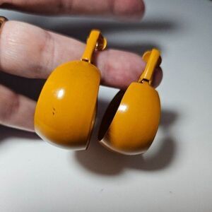 Pumpkin orange colored clip on earrings